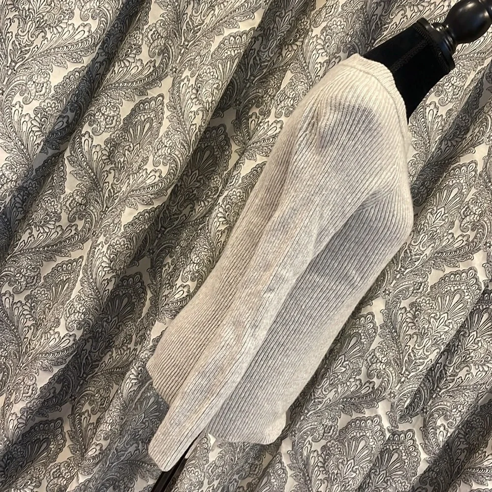 Gray crewneck sweater with lace up detail
